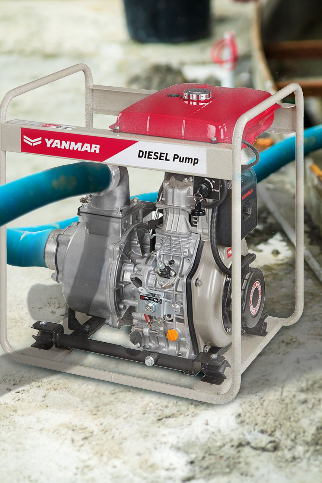 A YANMAR diesel pump working on a job site with hoses running